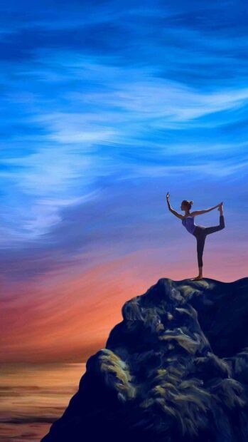 A person performing a yoga pose on a rocky cliff with a colorful sunset sky, HD Mobile Wallpaper