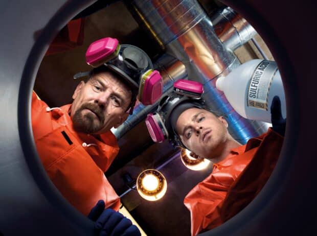 Two men wearing respirators and orange suits handling chemicals, HD Desktop Wallpaper