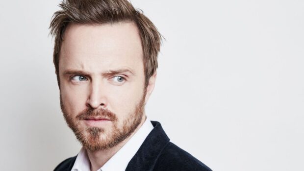 Aaron Paul looks thoughtful with a neutral background, HD Desktop Wallpaper