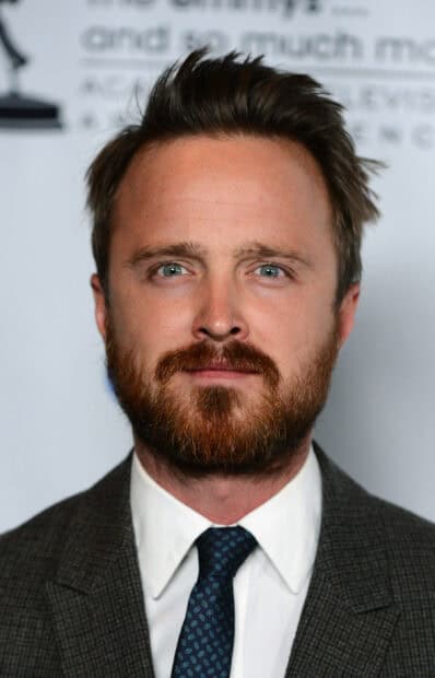 A close up portrait of Aaron Paul with a beard and suit, 2K Mobile Wallpaper
