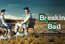 Aaron Paul is sitting outdoors with another man in a desert setting, 4K Desktop Wallpaper