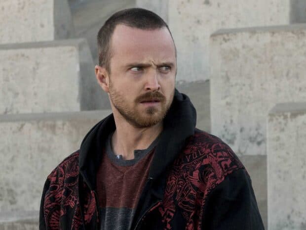 Aaron Paul looking seriously to the side with patterned jacket near stone steps, HD Desktop Wallpaper