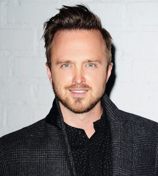 Aaron Paul looks directly at the camera wearing a dark jacket, HD Desktop Wallpaper