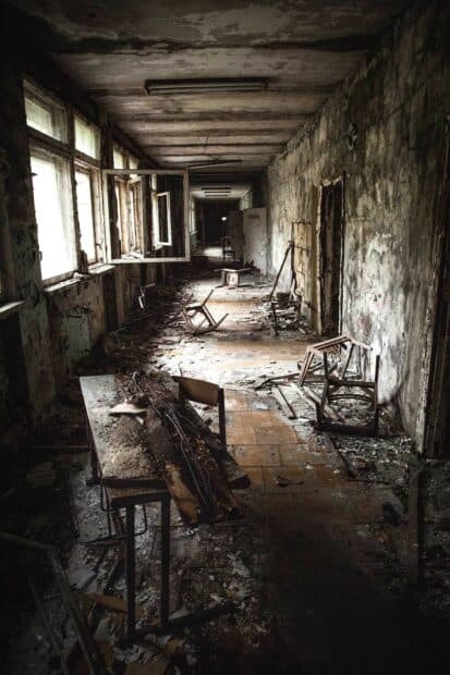 The abandoned hall features broken furniture and decayed walls in the ghost town, HD Mobile Wallpaper