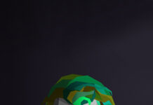 A colorful geometric portrait of the Joker character created in the style of Justin Maller Wallpapers, HD Phone Wallpaper