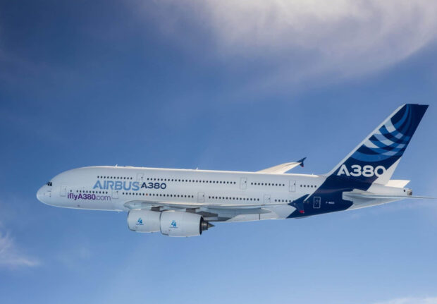 An Airbus A380 is flying smoothly under a clear blue sky, HD Desktop Wallpaper