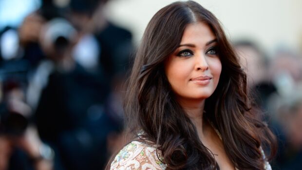 Aishwarya Rai looks stunning in a detailed embroidered outfit with soft waves in her hair, 4K Desktop Wallpaper