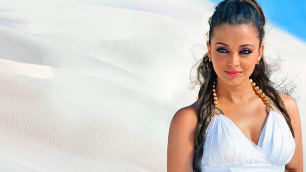 Aishwarya Rai wallpapers show her looking stunning with a white dress and long hair, 4K Desktop Wallpaper