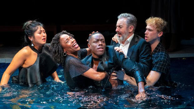 Alan Cumming wallpapers show a dramatic moment with five people in water, 2K Desktop Wallpaper