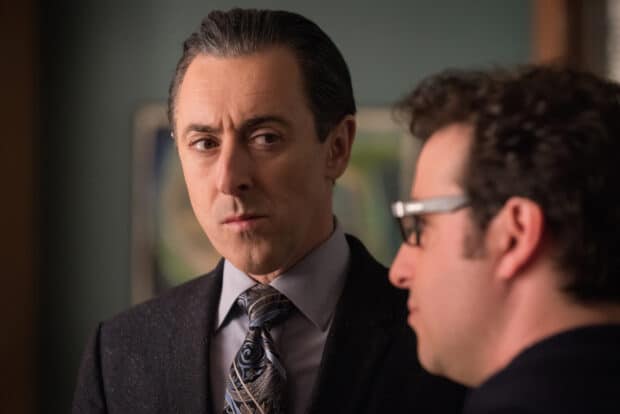 Alan Cumming is shown giving a serious look while speaking to another man, HD Desktop Wallpaper