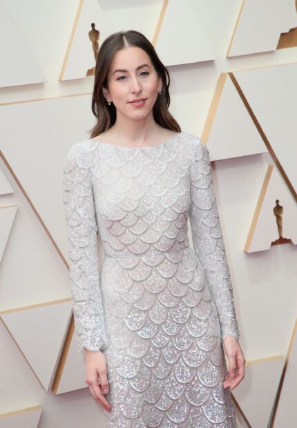 Alana Haim wears a white shimmering dress with scalloped details at an event, 2K Mobile Wallpaper