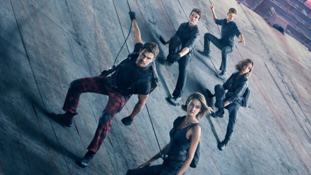 Allegiant Wallpapers characters are climbing a steep wall in this intense action scene, 4K Desktop Wallpaper