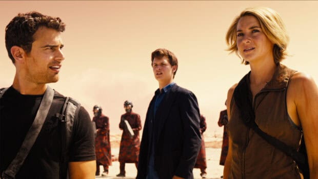 The Allegiant characters stand tense in a desert setting, HD Desktop Wallpaper