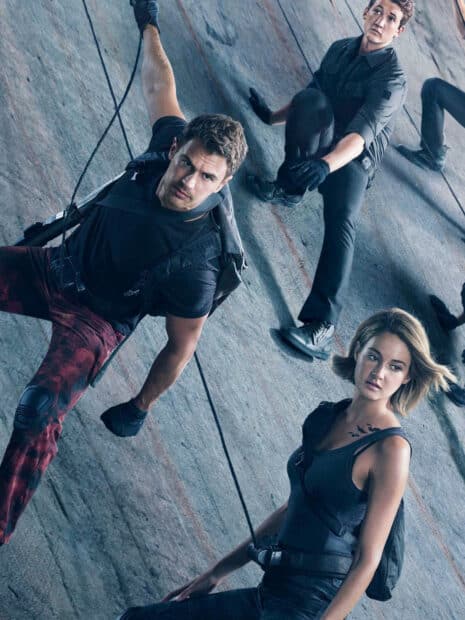 A group from Allegiant Wallpapers is seen climbing a steep wall during a mission, HD Mobile Wallpaper