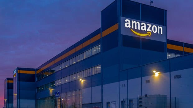 A large Amazon building with illuminated logo during evening, HD Desktop Wallpaper