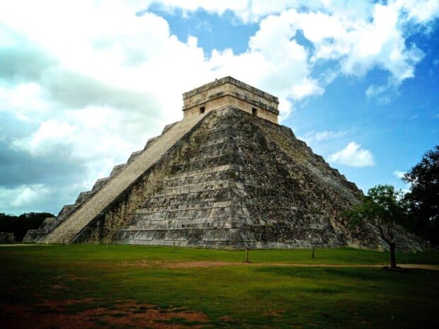 The ancient Chichen Itza pyramid stands tall under a partly cloudy sky, Chichen Itza Wallpapers, HD Desktop Wallpaper