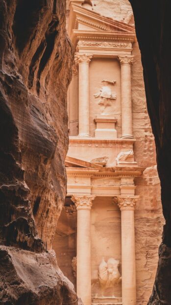 The image shows the famous carved facade of Petra Jordan between rock walls, HD Mobile Wallpaper