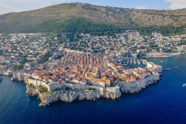 The ancient city walls in Dubrovnik surround the historic old town near the Adriatic Sea, HD Desktop Wallpaper