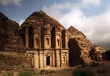 The ancient monastery carved into the rock is a famous Petra Jordan sight, 2K Desktop Wallpaper