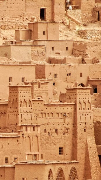Traditional ancient mudbrick buildings create a warm earthy scene in Morocco, HD Mobile Wallpaper