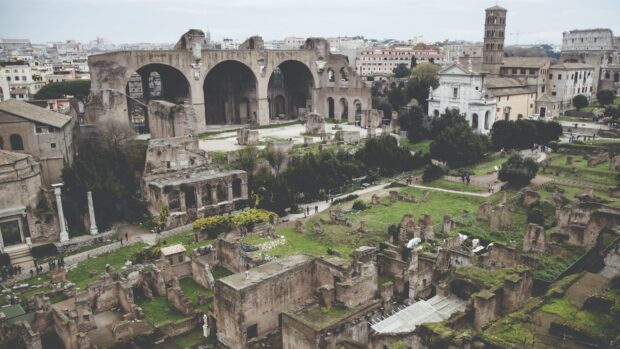A wide view of ancient ruins with greenery in Pompeii city, 4K Desktop Wallpaper