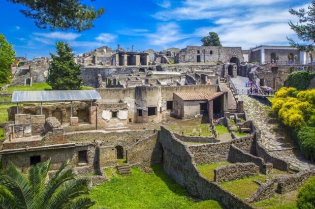 The ancient ruins of Pompeii showcase historical architecture under a bright blue sky, HD Desktop Wallpaper
