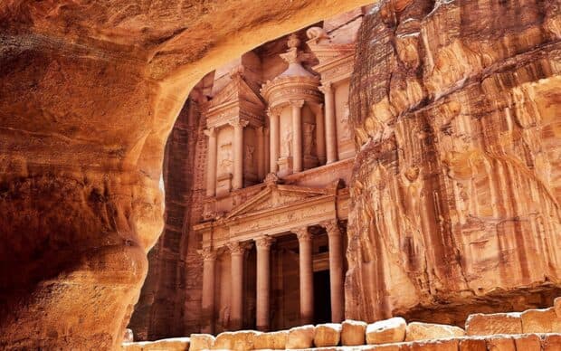 The famous Petra Jordan Wallpapers carved into rose red cliffs stand impressively within a natural stone frame, HD Desktop Wallpaper