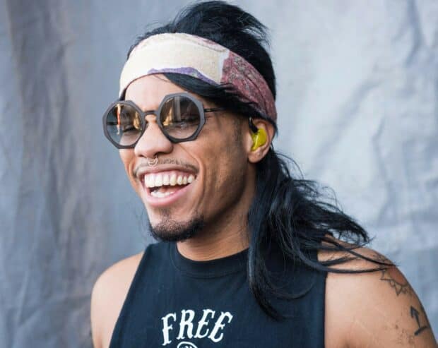 Anderson Paak is smiling wearing sunglasses and a headband in this portrait, HD Desktop Wallpaper
