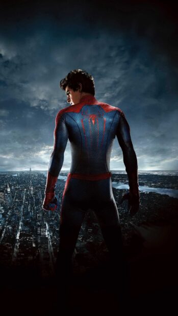 Andrew Garfield stands overlooking the city in his Spider Man suit, 2K Phone Wallpaper