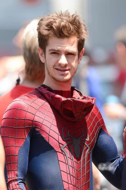 Andrew Garfield wearing the Spider Man suit stands outdoors during filming, HD Mobile Wallpaper