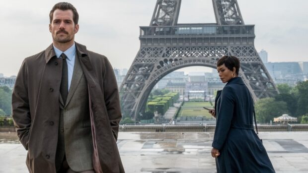 Angela Bassett stands near the Eiffel Tower with a man in a coat and suit, HD Desktop Wallpaper