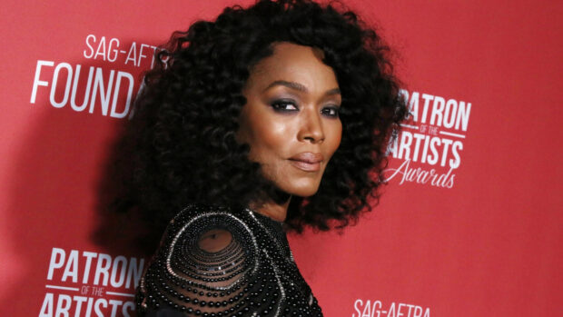 Angela Bassett smiles confidently in a detailed black outfit at an event, HD Desktop Wallpaper