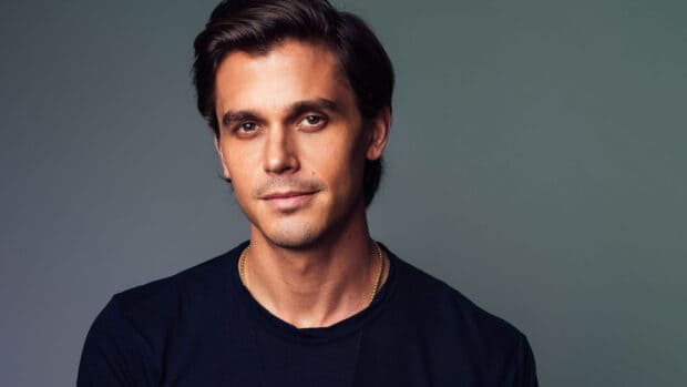 Antoni Porowski looks directly at the camera with a calm expression, 2K Desktop Wallpaper