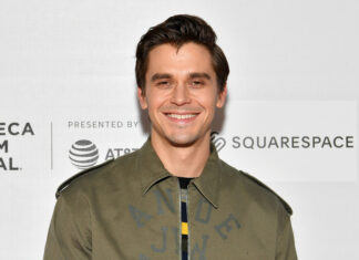 Antoni Porowski wallpapers featuring a smiling man in a green jacket, HD Desktop Wallpaper