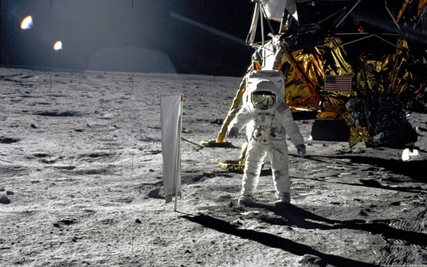 An astronaut standing near the lunar module on the moon during Apollo 13 mission, HD Desktop Wallpaper