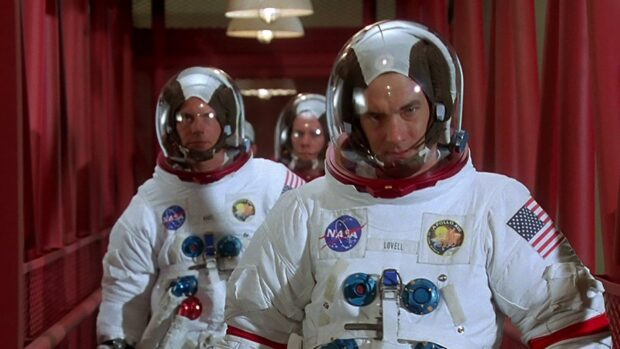 The Apollo 13 astronauts walk down a corridor in their space suits before the mission launch, HD Desktop Wallpaper