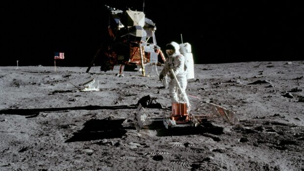An astronaut on the moon operates equipment near the lunar module during the Apollo 13 mission, HD Desktop Wallpaper