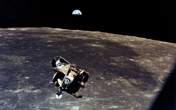 The Apollo 13 spacecraft orbits the moon with Earth visible in the background, HD Desktop Wallpaper