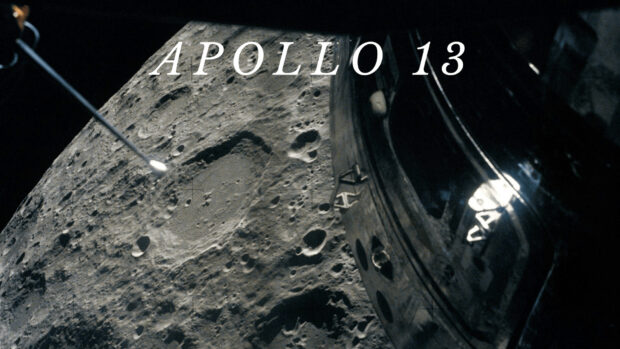 The Apollo 13 spacecraft is captured orbiting the moon's surface during the mission, HD Desktop Wallpaper