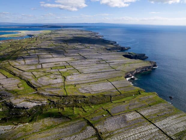 Aerial view of The Aran Islands with stone walls and ocean scenery, HD Desktop Wallpaper