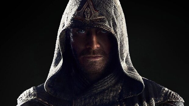 A hooded character from Assassins Creed movie stares intensely, HD Desktop Wallpaper