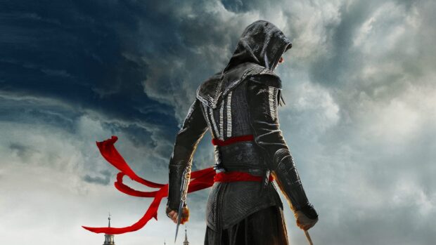 A character from Assassins Creed Movie stands with a red sash under a cloudy sky, HD Desktop Wallpaper