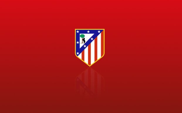The Atletico Madrid emblem is centered on a red background with a glossy reflection, HD Desktop Wallpaper