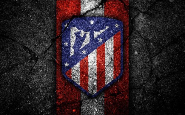 The Atletico Madrid emblem is displayed on a cracked and textured surface, HD Desktop Wallpaper