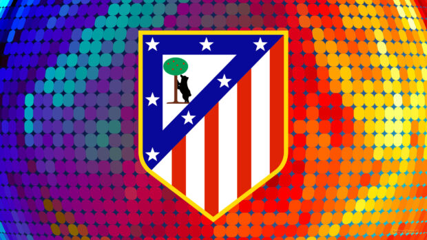 The Atletico Madrid emblem is displayed on a vibrant dotted background, 2K Desktop Wallpaper