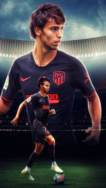 A soccer player from Atletico Madrid is controlling the ball on the field during a match, HD Phone Wallpaper