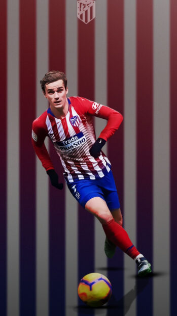 A soccer player wearing the Atletico Madrid jersey is running with the ball on the striped background, HD Phone Wallpaper