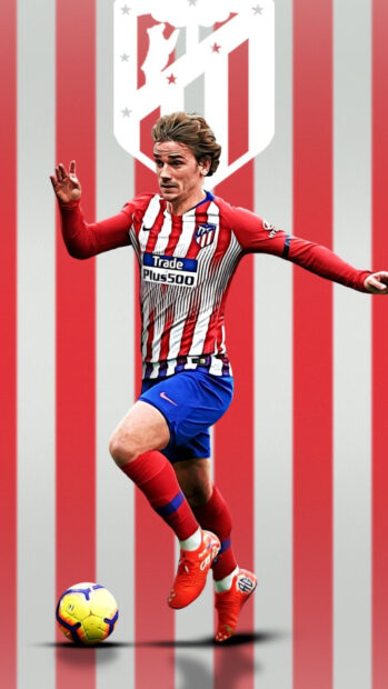 A soccer player from Atletico Madrid dribbling the ball in a dynamic pose, HD Phone Wallpaper