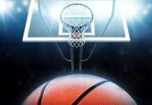 A basketball is about to enter the hoop during a goal sports event, 4K Desktop Wallpaper