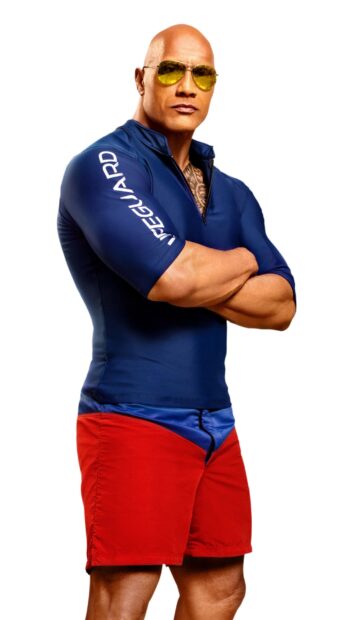 A strong lifeguard wearing sunglasses and a blue shirt is standing confidently in the Baywatch movie, 2K Desktop Wallpaper